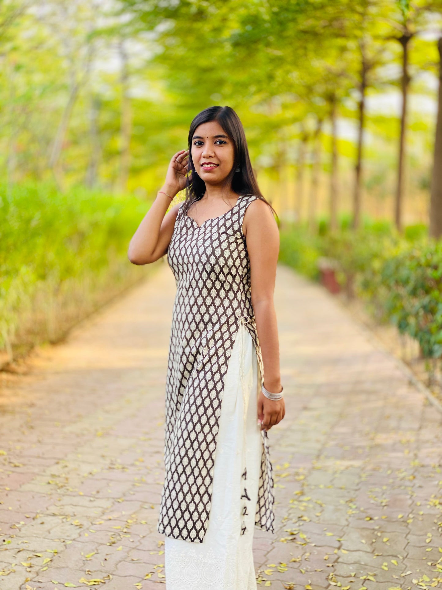 White leaf sleeveless long kurti